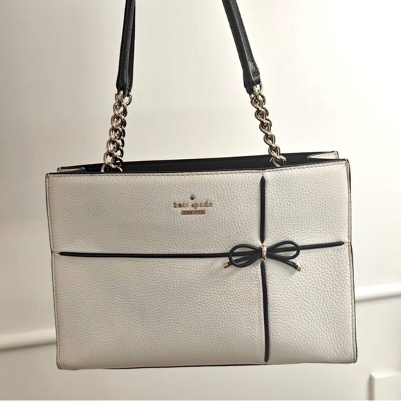 kate spade Handbags - NWOT Kate Spade Cherry Street Phoebe Small Cream & Black NWOT *NEVER USED*